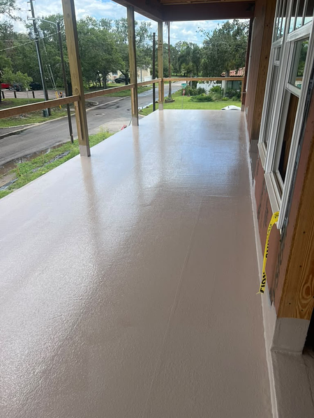 Completed elevated balcony with a seamless light-colored gel coat finish