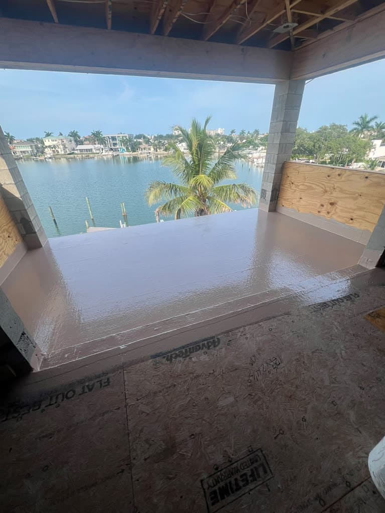 Waterfront balcony deck at sunset on Florida's Gulf Coast, waterproofed with a seamless fiberglass system by Atinez
