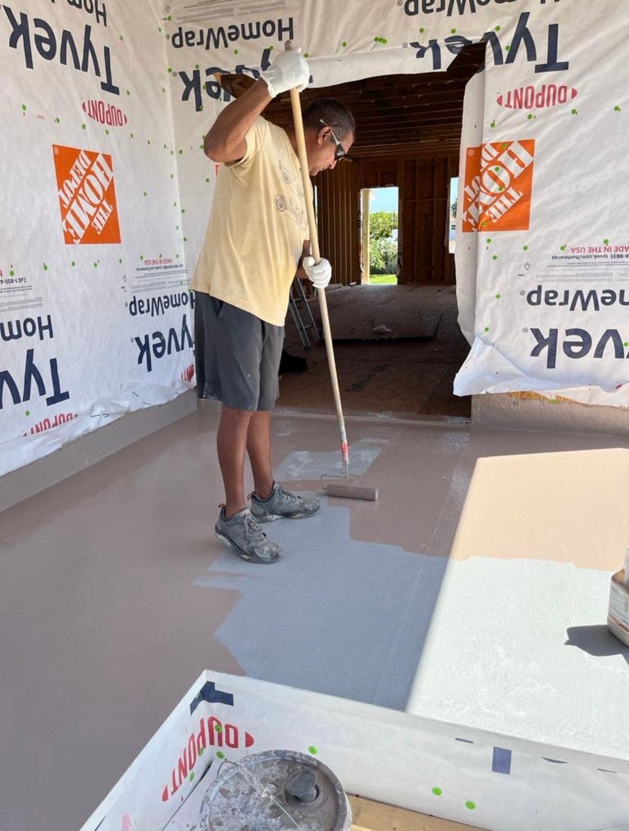 Structural framing exposed during a fiberglass balcony deck repair by Atinez
