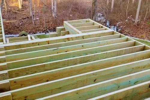 Deck joist framing prepared as the substrate for a fiberglass lamination system